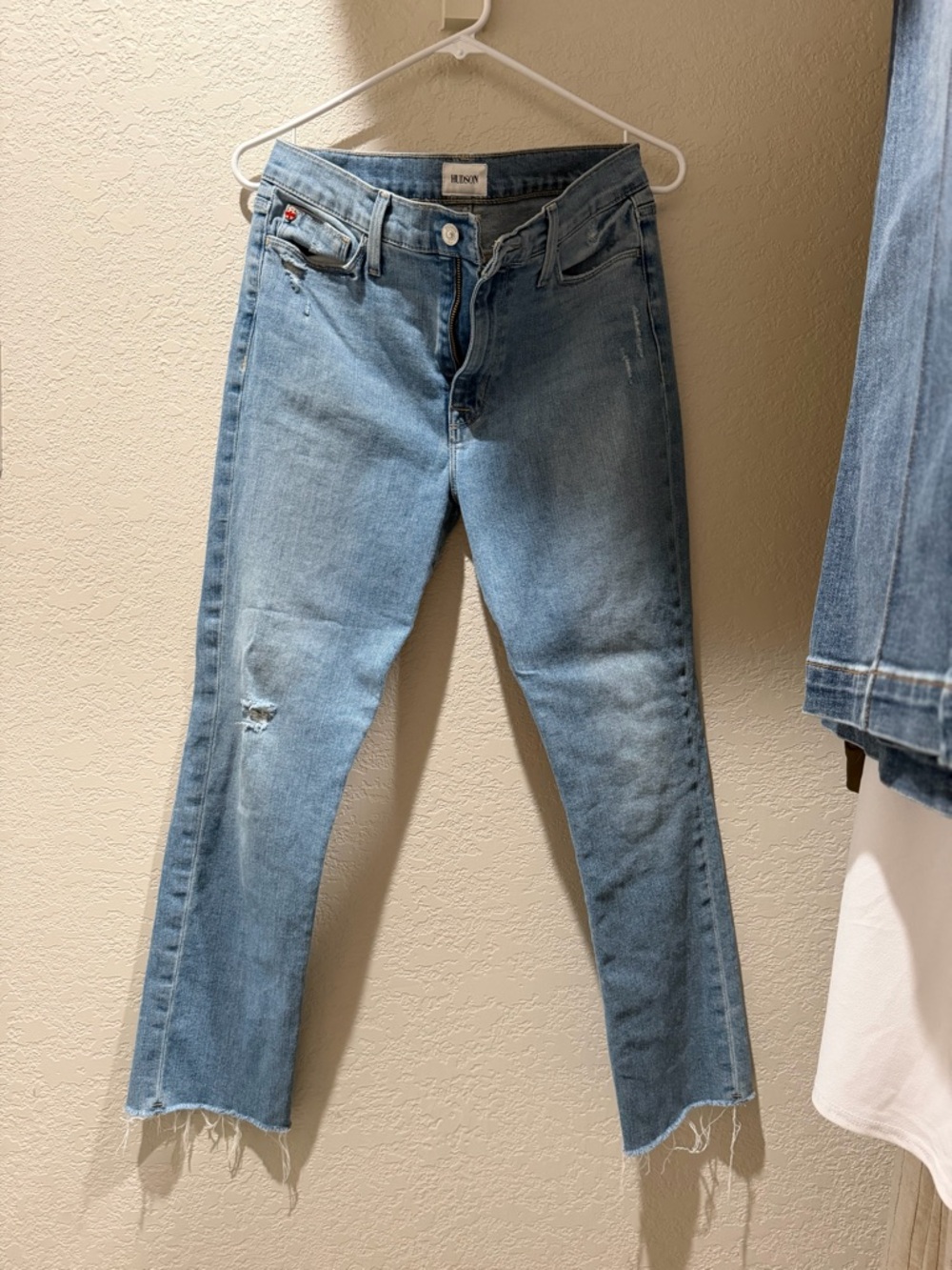 Hudson Jeans light blue straight leg jeans with frayed hem